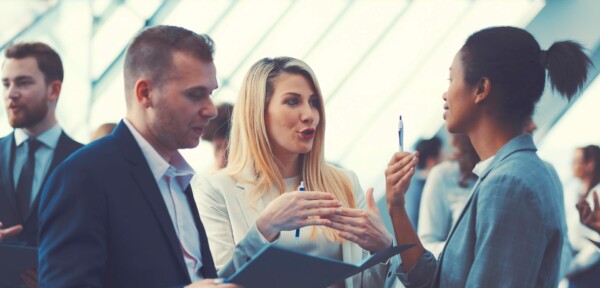 Business people talking at an event